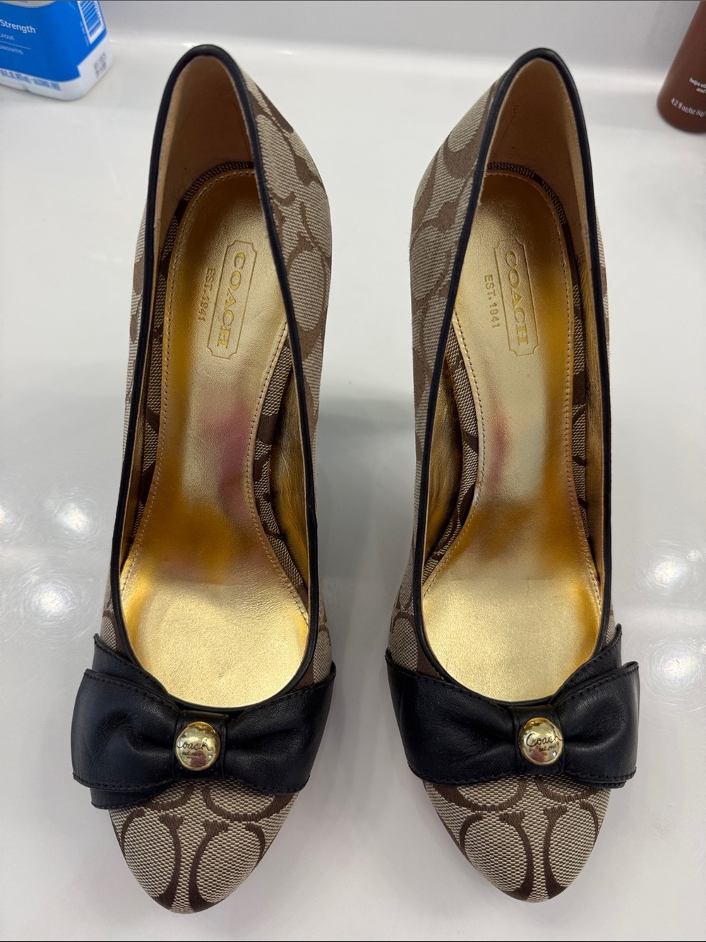 Coach Brown Signature Canvas Pointed-Toe Pumps with Black Bow